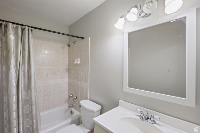 3018 S Asplund Cir, Salt Lake City, UT 84119 - bathroom featuring shower / tub combo, toilet, and vanity