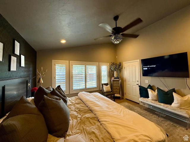 6991 S Canyon Pines Cir E, Cottonwood Heights, UT 84121 - bedroom featuring a textured ceiling, ceiling fan, and vaulted ceiling