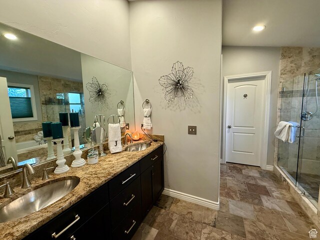 6991 S Canyon Pines Cir E, Cottonwood Heights, UT 84121 - full bathroom with baseboards, double vanity, a sink, and a shower stall