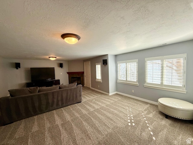 6991 S Canyon Pines Cir E, Cottonwood Heights, UT 84121 - living area with carpet floors, a fireplace, a textured ceiling, baseboards, and visible vents