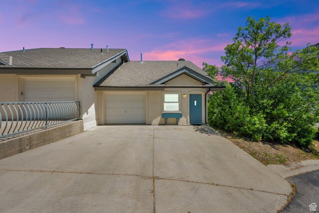882 Schneitter Cir, Midway, UT 84049 - view of front of home featuring concrete driveway, a shingled roof, a garage, and stucco siding