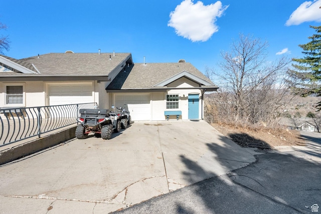 882 Schneitter Cir, Midway, UT 84049 - view of property exterior featuring stucco siding, a shingled roof, an attached garage, and concrete driveway