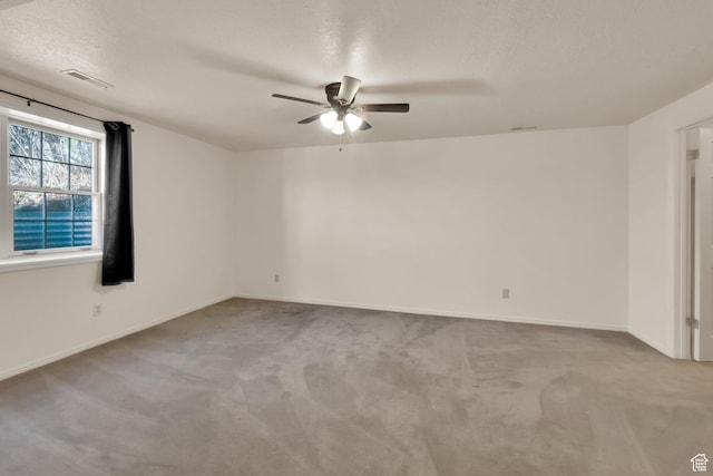 882 Schneitter Cir, Midway, UT 84049 - carpeted spare room with a ceiling fan, baseboards, and a textured ceiling