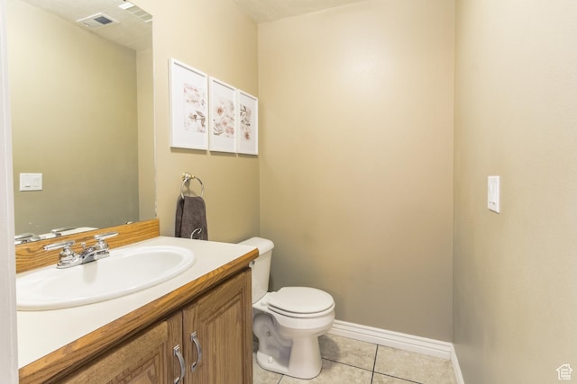 414 S 3130 W, Vernal, UT 84078 - half bath with visible vents, baseboards, toilet, vanity, and tile patterned flooring