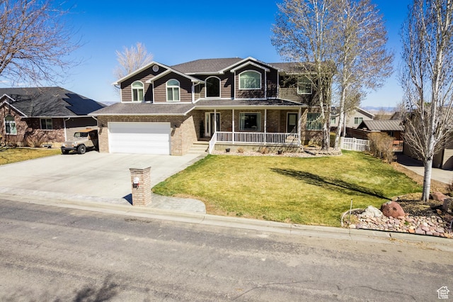 414 S 3130 W, Vernal, UT 84078 - view of front of house with an attached garage, a front yard, brick siding, driveway, and a porch