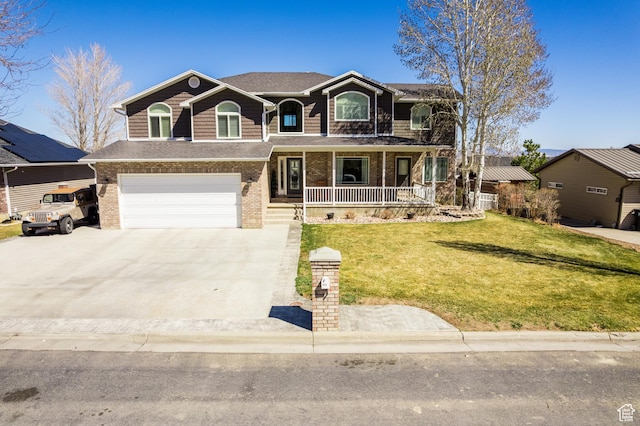 414 S 3130 W, Vernal, UT 84078 - view of front of home with covered porch, a garage, brick siding, and a front yard
