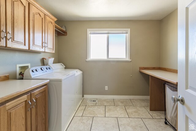 414 S 3130 W, Vernal, UT 84078 - washroom with light tile patterned floors, baseboards, visible vents, washer and dryer, and cabinet space
