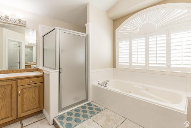 414 S 3130 W, Vernal, UT 84078 - bathroom featuring a stall shower, a whirlpool tub, vanity, and tile patterned floors