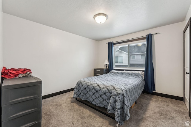 483 N 2650 W Unit 6, Tremonton, UT 84337 - bedroom featuring baseboards and carpet flooring