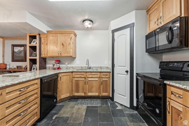 483 N 2650 W Unit 6, Tremonton, UT 84337 - kitchen featuring a textured ceiling, stone finish flooring, a sink, light stone counters, and black appliances
