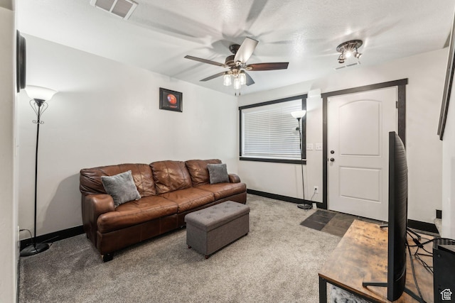 483 N 2650 W Unit 6, Tremonton, UT 84337 - carpeted living area featuring a ceiling fan, baseboards, and visible vents