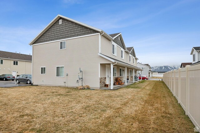 483 N 2650 W Unit 6, Tremonton, UT 84337 - view of home's exterior featuring fence and a yard