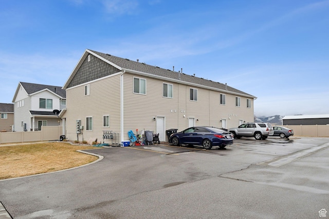 483 N 2650 W Unit 6, Tremonton, UT 84337 - back of property featuring uncovered parking and fence