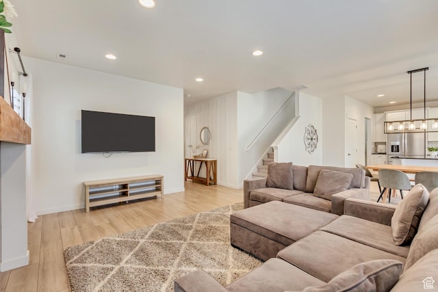 2022 E 970 N, Spanish Fork, UT 84660 - living area featuring stairs, light wood-style flooring, recessed lighting, and baseboards