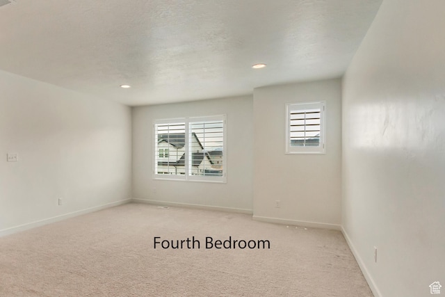2022 E 970 N, Spanish Fork, UT 84660 - empty room featuring plenty of natural light, light colored carpet, baseboards, and recessed lighting