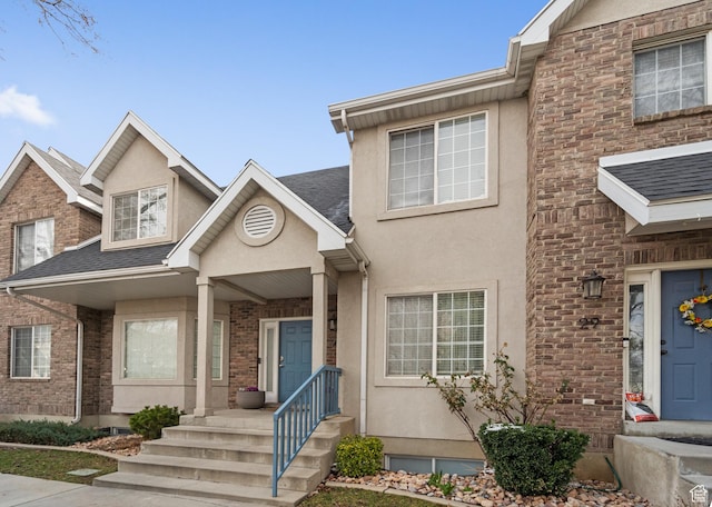 townhome / multi-family property with stucco siding