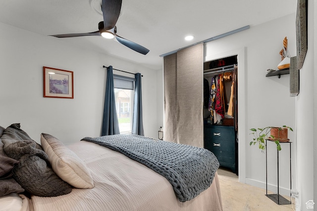 bedroom featuring baseboards, a closet, and ceiling fan