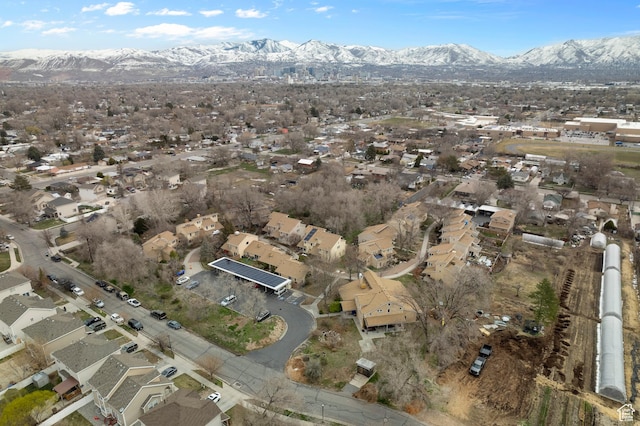 drone / aerial view with a residential view and a mountain view