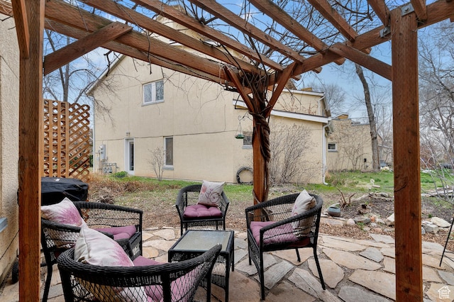 view of patio featuring a pergola