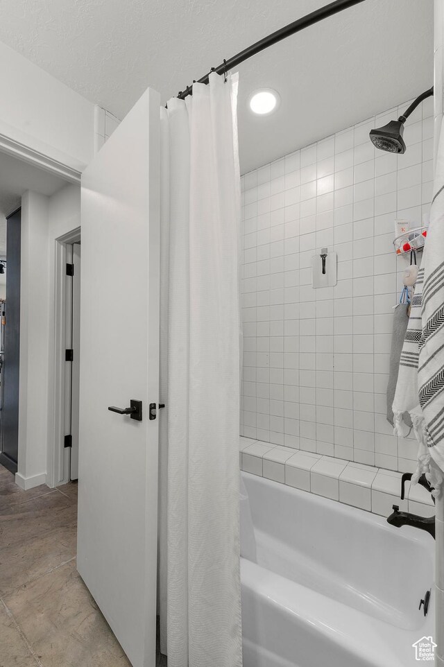 full bathroom featuring shower / bath combination with curtain and recessed lighting