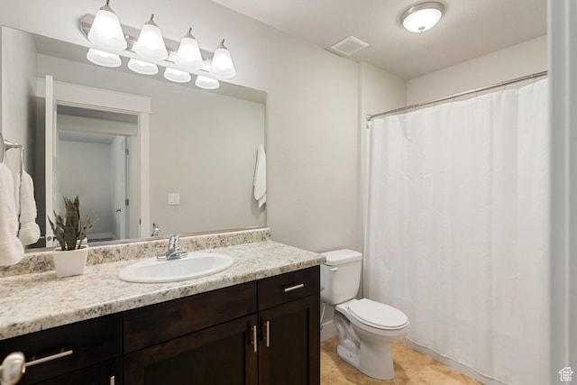 259 W 40 N, Hyrum, UT 84319 - full bath featuring toilet, vanity, a shower with curtain, and tile patterned flooring