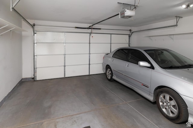 259 W 40 N, Hyrum, UT 84319 - garage with a garage door opener and baseboards