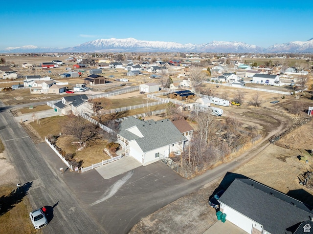 drone / aerial view with a mountain view and a residential view