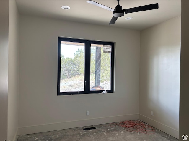 2220 E Flat Top Mountain Dr, Heber City, UT 84032 - spare room featuring baseboards, a ceiling fan, concrete floors, and recessed lighting