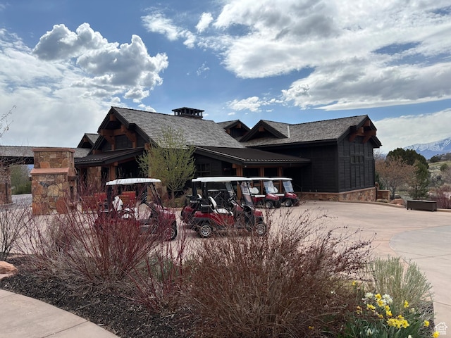 2220 E Flat Top Mountain Dr, Heber City, UT 84032 - view of front facade featuring stone siding and driveway
