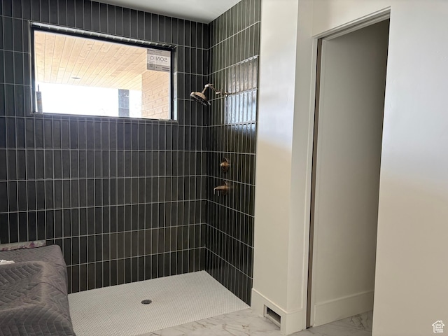 2220 E Flat Top Mountain Dr, Heber City, UT 84032 - bathroom with marble look tile flooring and a tile shower