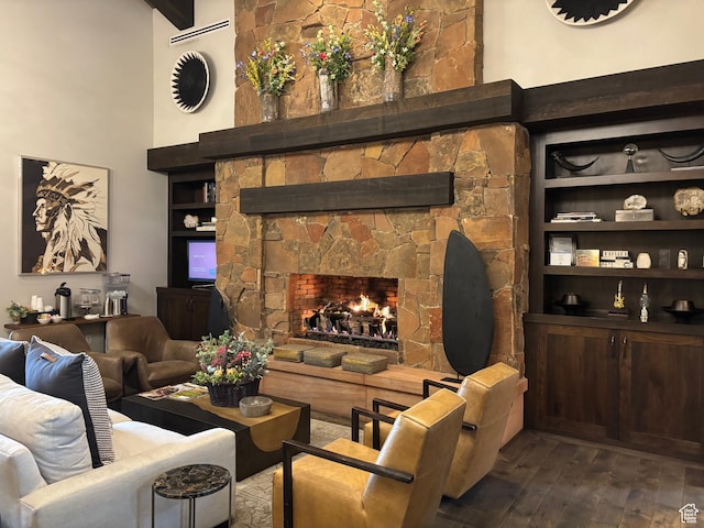 2220 E Flat Top Mountain Dr, Heber City, UT 84032 - living room with dark wood-type flooring, a fireplace, built in shelves, and a high ceiling