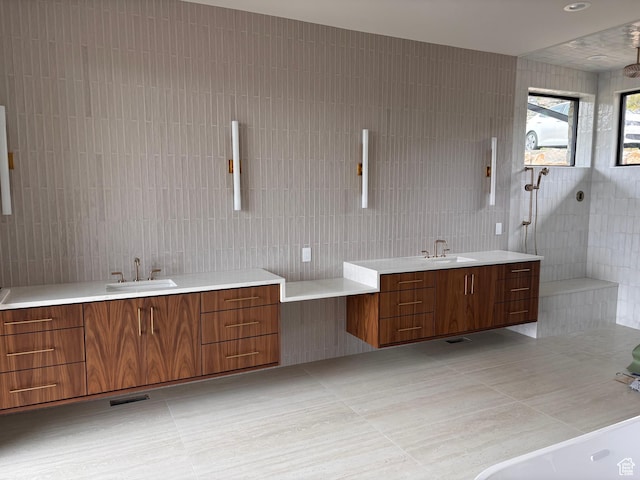 2220 E Flat Top Mountain Dr, Heber City, UT 84032 - full bathroom with tile walls, two vanities, tile patterned flooring, and tasteful backsplash