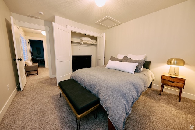 6889 W Lake Ave, South Jordan, UT 84009 - bedroom with a closet, attic access, a textured ceiling, baseboards, and carpet