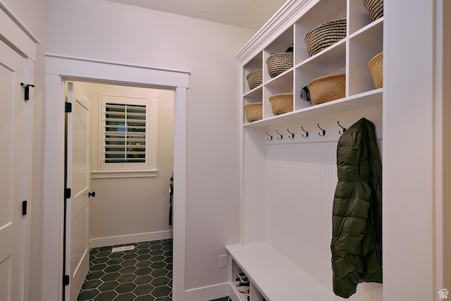 6889 W Lake Ave, South Jordan, UT 84009 - mudroom featuring baseboards