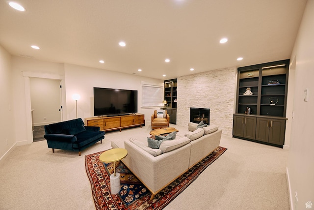 6889 W Lake Ave, South Jordan, UT 84009 - carpeted living room featuring a stone fireplace, baseboards, and recessed lighting