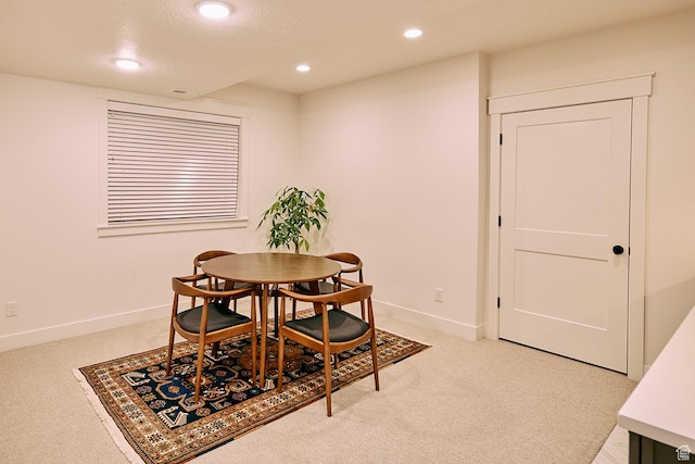 6889 W Lake Ave, South Jordan, UT 84009 - dining area with baseboards, a textured ceiling, recessed lighting, and light colored carpet