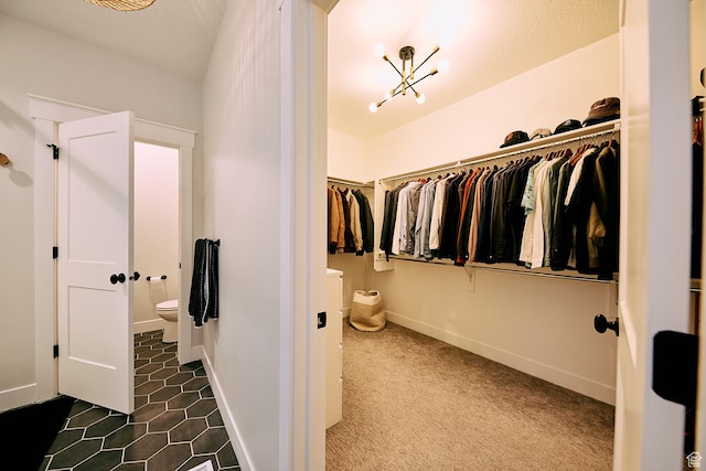 6889 W Lake Ave, South Jordan, UT 84009 - spacious closet with dark tile patterned floors
