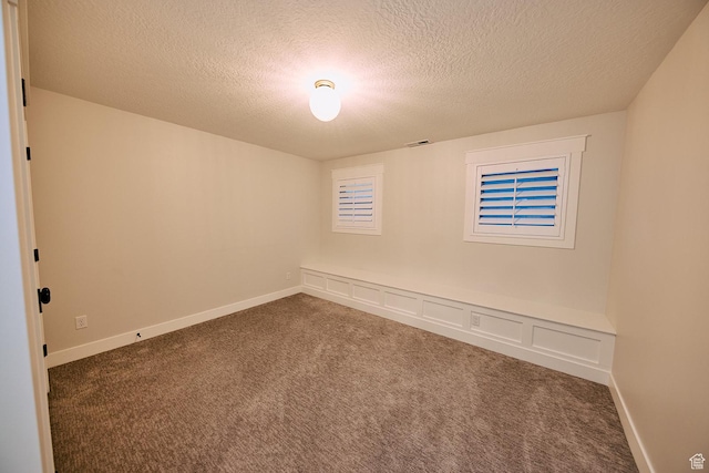 6889 W Lake Ave, South Jordan, UT 84009 - carpeted empty room featuring baseboards, visible vents, and a textured ceiling