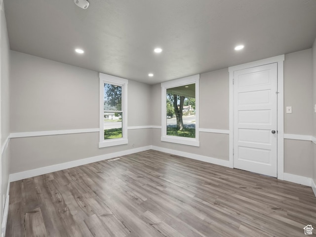 312 S 200 E, Spanish Fork, UT 84660 - unfurnished room with baseboards, visible vents, wood finished floors, and recessed lighting