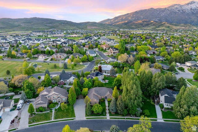 6208 W Bull River Rd, Highland, UT 84003 - aerial view at dusk of a mountain view and a residential view