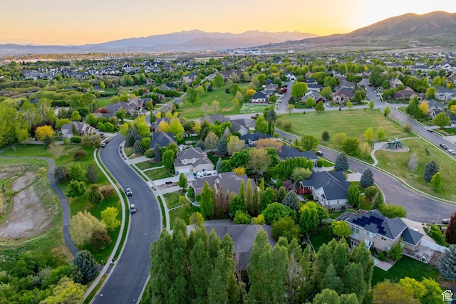 6208 W Bull River Rd, Highland, UT 84003 - aerial view at dusk of a mountain view and a residential view