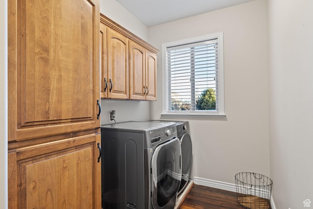 6208 W Bull River Rd, Highland, UT 84003 - clothes washing area with washing machine and dryer, cabinet space, baseboards, and dark wood-style floors