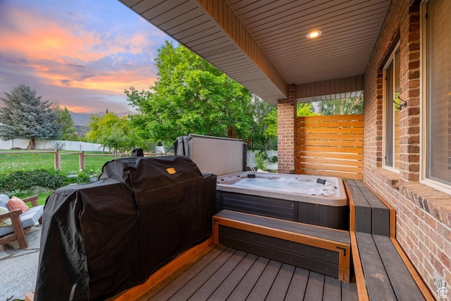 6208 W Bull River Rd, Highland, UT 84003 - deck at dusk with a hot tub