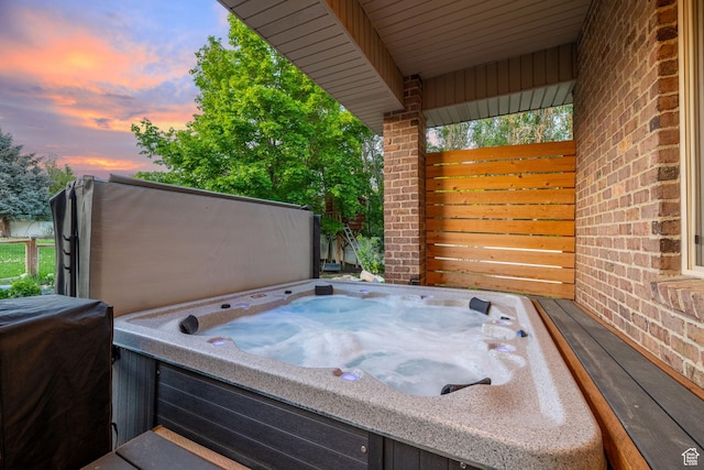 6208 W Bull River Rd, Highland, UT 84003 - patio terrace at dusk featuring a hot tub