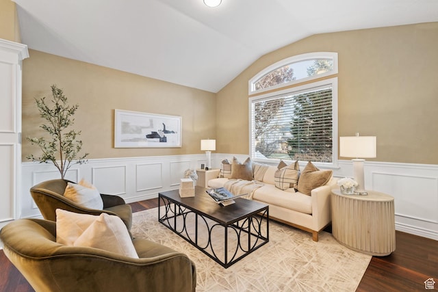 6208 W Bull River Rd, Highland, UT 84003 - living room featuring vaulted ceiling, wood finished floors, wainscoting, and a decorative wall