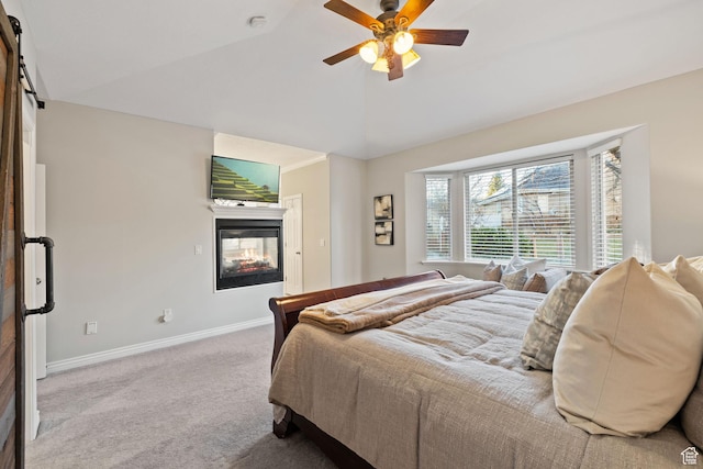 6208 W Bull River Rd, Highland, UT 84003 - carpeted bedroom featuring lofted ceiling, baseboards, ceiling fan, and a barn door