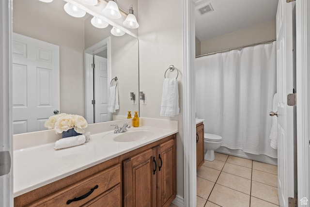 6208 W Bull River Rd, Highland, UT 84003 - bathroom featuring vanity, tile patterned flooring, and toilet