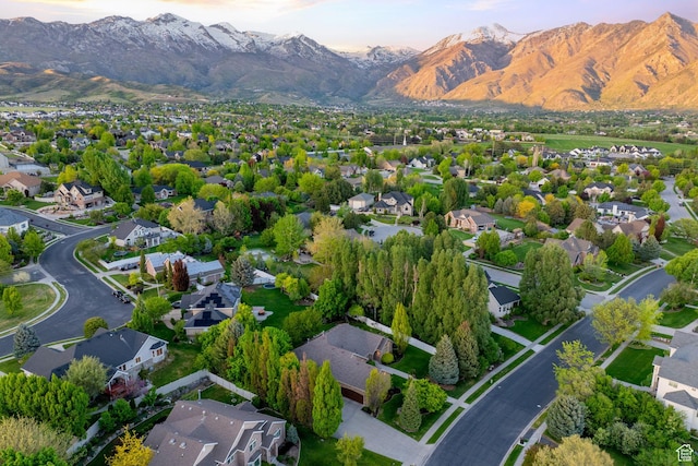 6208 W Bull River Rd, Highland, UT 84003 - aerial view of property and surrounding area featuring mountains and nearby suburban area