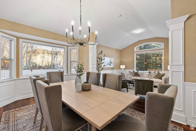 6208 W Bull River Rd, Highland, UT 84003 - dining room with a decorative wall, lofted ceiling, dark wood-style flooring, a wainscoted wall, and a chandelier