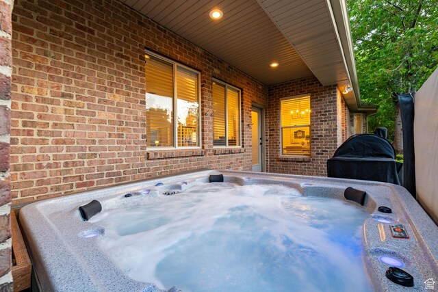 6208 W Bull River Rd, Highland, UT 84003 - view of patio with a hot tub